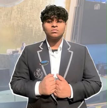 Smyan Bansal in a school blazer at a Model UN conference hall